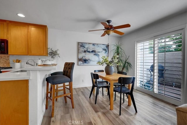 11 Exeter, Irvine, CA 92612 - dining room with ceiling fan, light wood-style floors, and recessed lighting