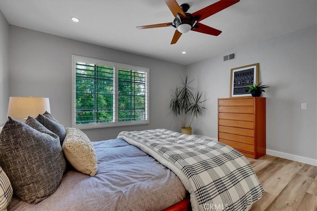 11 Exeter, Irvine, CA 92612 - bedroom featuring light wood-type flooring, recessed lighting, and a ceiling fan