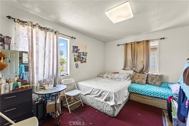 730 W 52nd Pl, Los Angeles, CA 90037 - bedroom featuring multiple windows