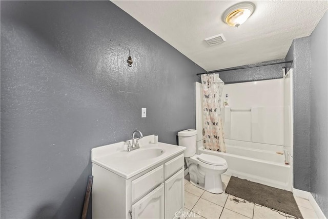 730 W 52nd Pl, Los Angeles, CA 90037 - full bathroom with tile patterned flooring, a textured wall, shower / bath combo, and vanity