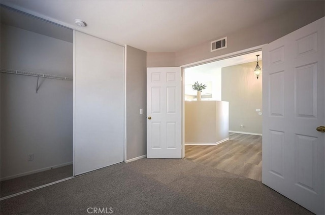 3087 Arbor Glen Ct, Corona, CA 92879 - unfurnished bedroom featuring carpet flooring and a closet