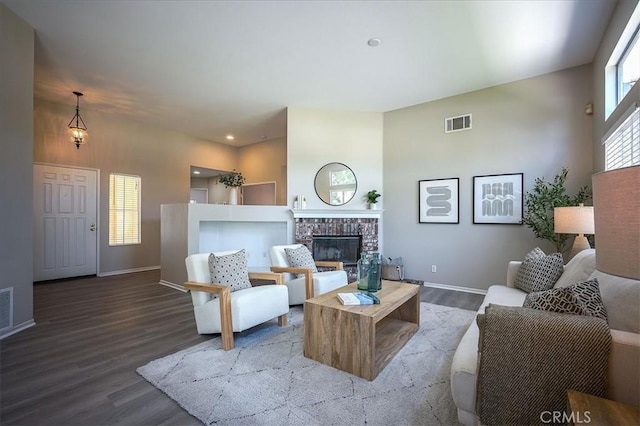 3087 Arbor Glen Ct, Corona, CA 92879 - living room with wood finished floors, a glass covered fireplace, recessed lighting, and a high ceiling