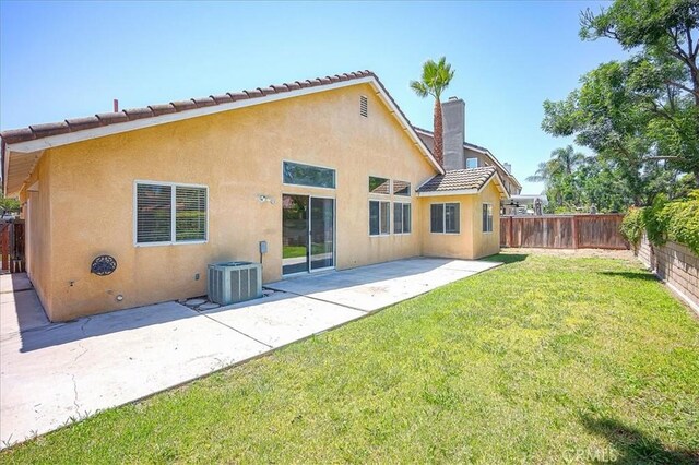 3087 Arbor Glen Ct, Corona, CA 92879 - back of property with stucco siding, a fenced backyard, a chimney, a patio area, and a tile roof