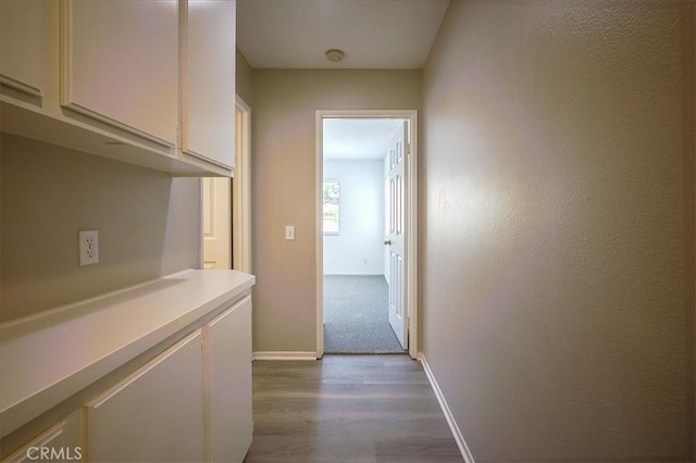 3087 Arbor Glen Ct, Corona, CA 92879 - corridor with dark wood finished floors and baseboards