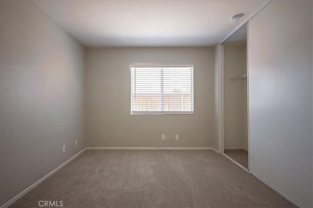 3087 Arbor Glen Ct, Corona, CA 92879 - empty room with a smoke detector and carpet flooring