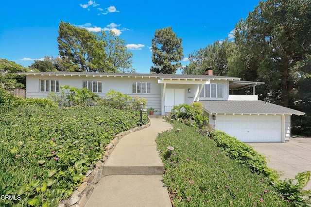 5240 Ramsdell Ave, La Crescenta, CA 91214 - ranch-style house featuring a garage, a chimney, and concrete driveway
