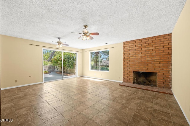5240 Ramsdell Ave, La Crescenta, CA 91214 - unfurnished living room with ceiling fan, a textured ceiling, and a fireplace