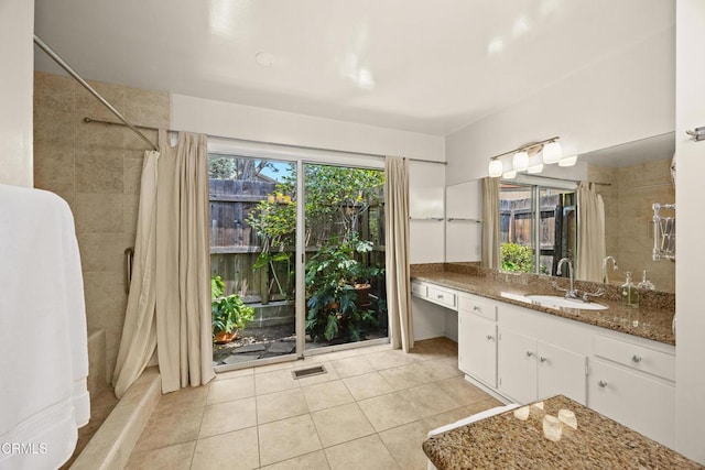 5240 Ramsdell Ave, La Crescenta, CA 91214 - full bath with vanity, tile patterned flooring, and tiled shower / bath
