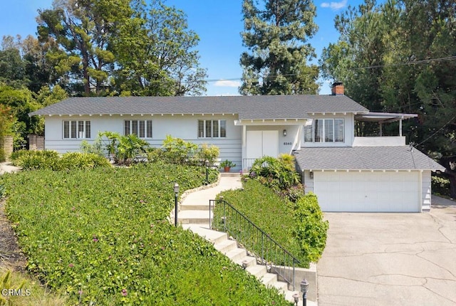 5240 Ramsdell Ave, La Crescenta, CA 91214 - view of front of home with driveway, a garage, roof with shingles, a chimney, and stairs
