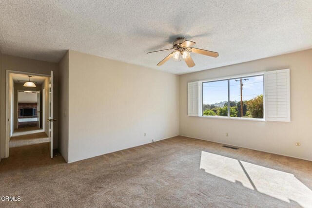 5240 Ramsdell Ave, La Crescenta, CA 91214 - spare room with carpet flooring, ceiling fan, and a textured ceiling