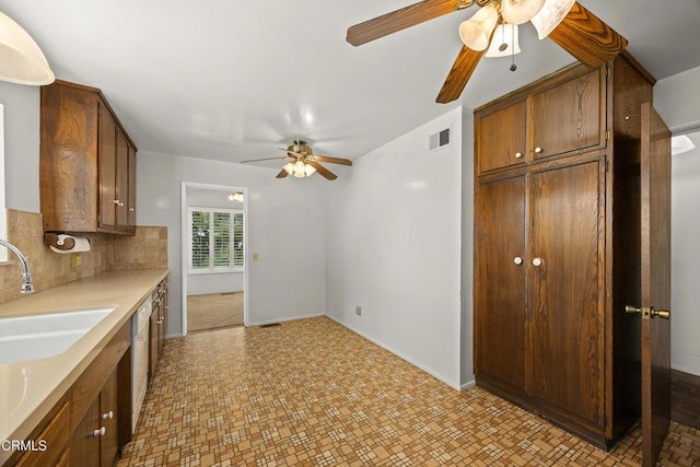 5240 Ramsdell Ave, La Crescenta, CA 91214 - kitchen with a ceiling fan, light countertops, dishwasher, backsplash, and light flooring