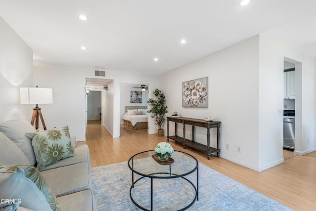4722 Park Granada Unit 206, Calabasas, CA 91302 - living area with light wood-style flooring, recessed lighting, and a ceiling fan