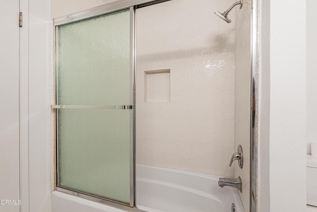 4722 Park Granada Unit 206, Calabasas, CA 91302 - bathroom with bath / shower combo with glass door