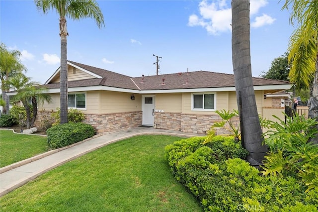 4441 Avocado Ave, Yorba Linda, CA 92886 - ranch-style home with a front yard and stone siding