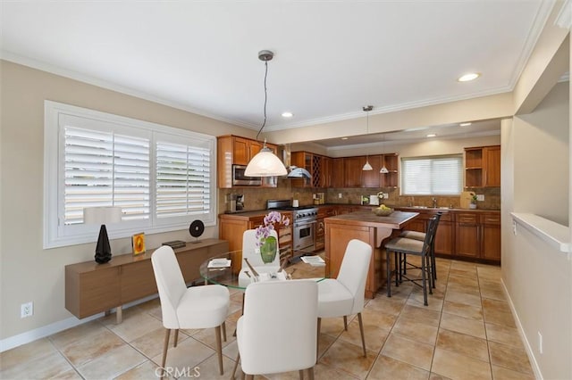 4441 Avocado Ave, Yorba Linda, CA 92886 - dining area featuring crown molding, light tile patterned floors, and recessed lighting