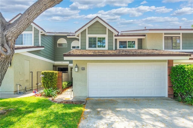 35 Havenwood Unit 83, Irvine, CA 92614 - multi unit property with stucco siding, driveway, and a garage