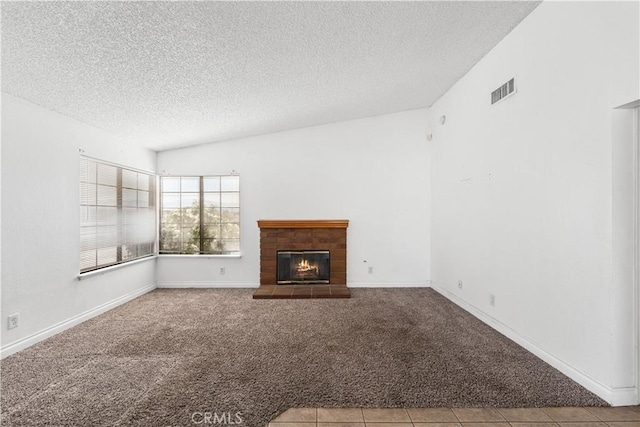 37756 45th, Palmdale, CA 93552 - unfurnished living room featuring carpet floors, a textured ceiling, and a fireplace