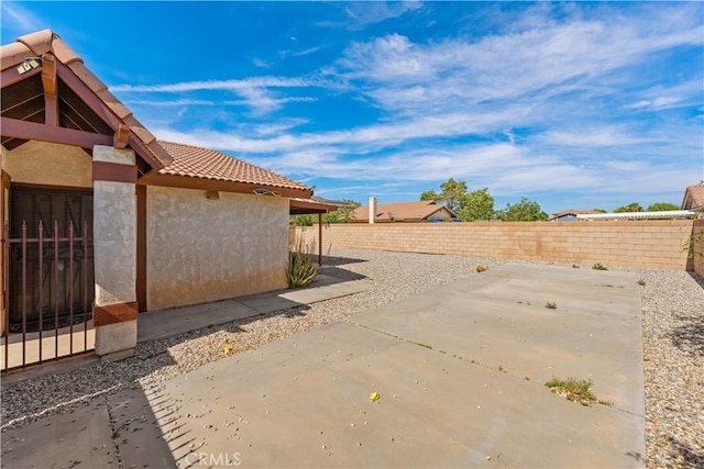 37756 45th, Palmdale, CA 93552 - fenced backyard with a patio
