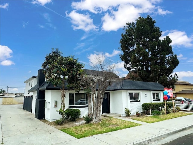 17412 Dairyview Cir Unit D, Huntington Beach, CA 92647 - single story home with stucco siding and a garage