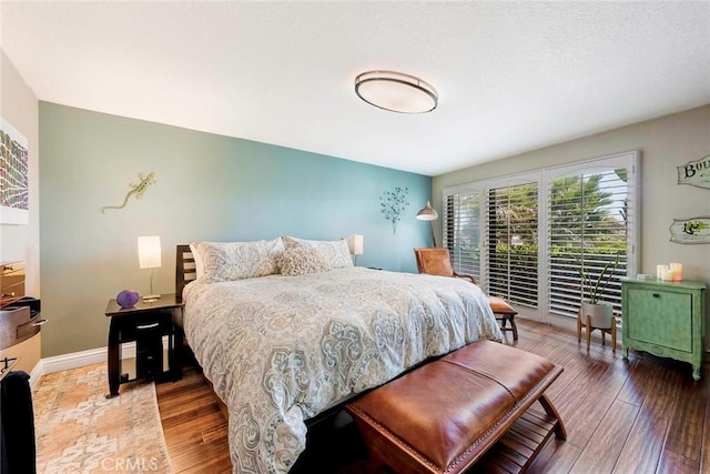 3811 E Livingston Dr Unit 1, Long Beach, CA 90803 - bedroom with wood finished floors and baseboards