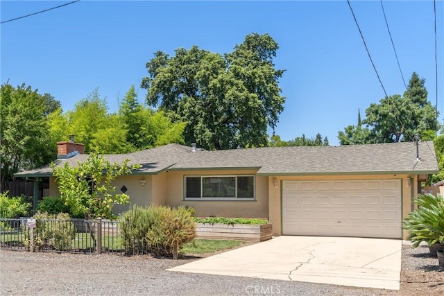 1220 Bidwell Ave, Chico, CA 95926 - single story home featuring stucco siding, an attached garage, driveway, a chimney, and a shingled roof