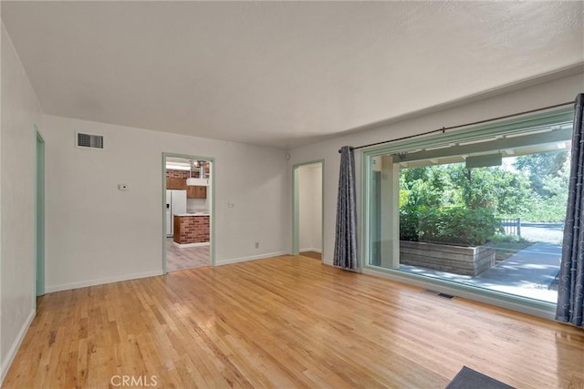 1220 Bidwell Ave, Chico, CA 95926 - unfurnished room featuring wood finished floors and baseboards