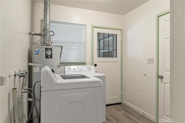 1220 Bidwell Ave, Chico, CA 95926 - washroom with light wood finished floors, washer and clothes dryer, and water heater