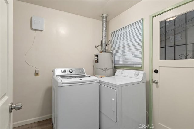 1220 Bidwell Ave, Chico, CA 95926 - washroom with strapped water heater, separate washer and dryer, and wood finished floors