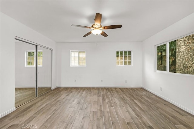 9912 Marshall St, El Monte, CA 91731 - unfurnished bedroom featuring light wood-type flooring, a closet, and a ceiling fan