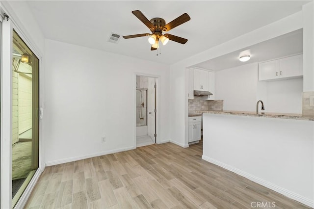 9912 Marshall St, El Monte, CA 91731 - unfurnished living room featuring light wood-style floors and a ceiling fan