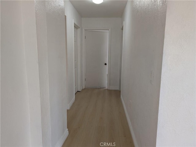 10051 Orchard St, Bloomington, CA 92316 - hall featuring light wood finished floors and baseboards