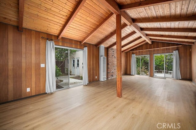 338 Prospect Ave, Long Beach, CA 90814 - unfurnished living room featuring wooden walls, wood finished floors, plenty of natural light, and wood ceiling