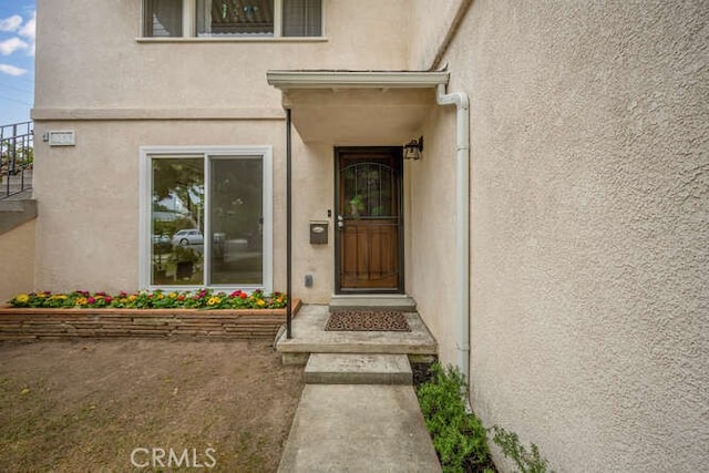 338 Prospect Ave, Long Beach, CA 90814 - view of exterior entry with stucco siding