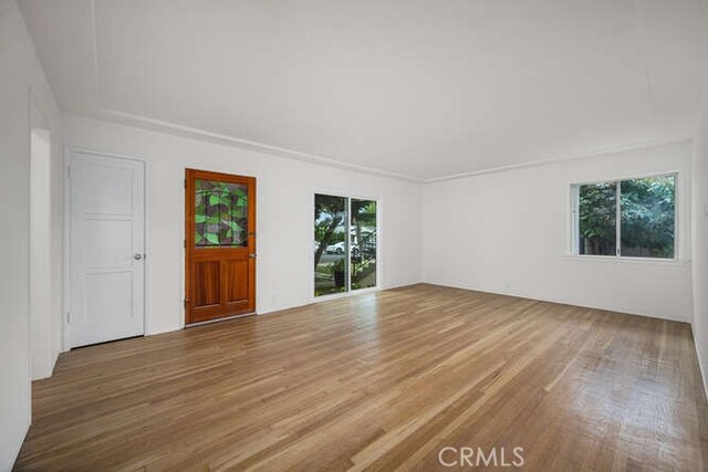 338 Prospect Ave, Long Beach, CA 90814 - unfurnished living room featuring wood finished floors