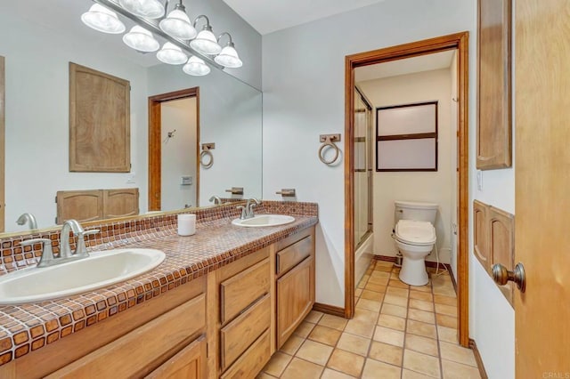 2702 Country Club Dr, Escondido, CA 92029 - full bathroom with double vanity, combined bath / shower with glass door, and tile patterned floors