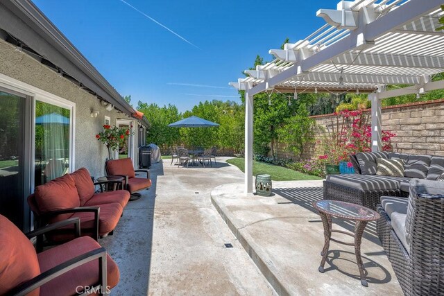 27817 Wakefield Rd, Castaic, CA 91384 - fenced backyard with outdoor dining space, outdoor lounge area, a pergola, and a patio