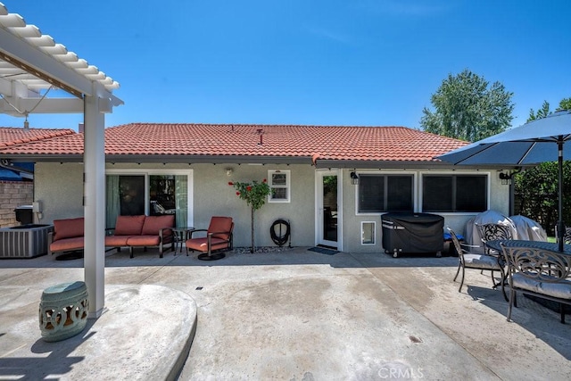 27817 Wakefield Rd, Castaic, CA 91384 - rear view of house with a tiled roof, a patio area, and stucco siding