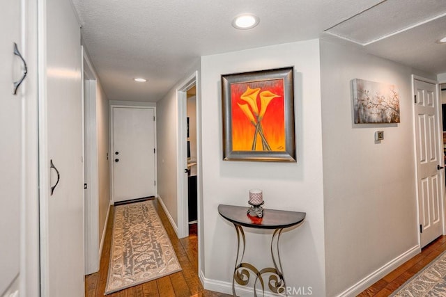27817 Wakefield Rd, Castaic, CA 91384 - corridor with wood-type flooring, recessed lighting, and a textured ceiling