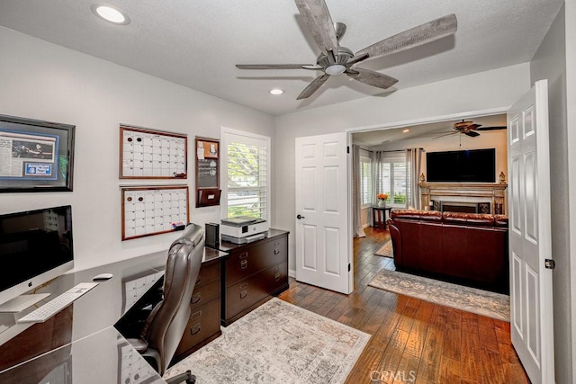 27817 Wakefield Rd, Castaic, CA 91384 - office featuring dark wood-type flooring, healthy amount of natural light, ceiling fan, and recessed lighting