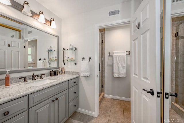 27817 Wakefield Rd, Castaic, CA 91384 - bathroom featuring a stall shower, vanity, and tile patterned floors
