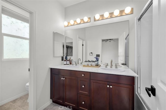 12039 Stanley Park Ct, Hawthorne, CA 90250 - full bath featuring double vanity, tile patterned floors, and enclosed tub / shower combo