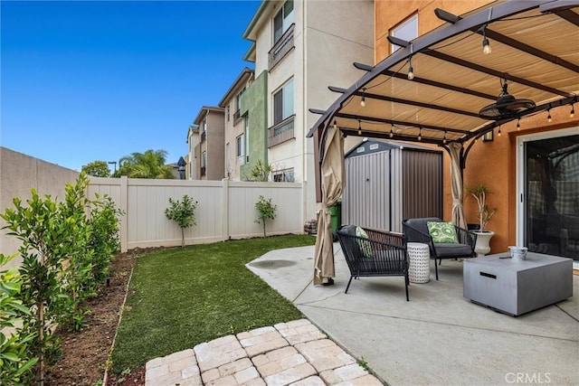 12039 Stanley Park Ct, Hawthorne, CA 90250 - fenced backyard featuring a ceiling fan, a patio area, a shed, and a pergola