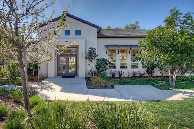 12039 Stanley Park Ct, Hawthorne, CA 90250 - view of front of property with french doors, stucco siding, and a front yard