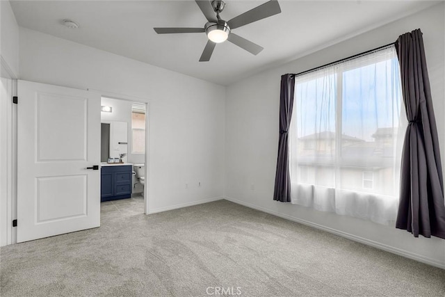 12039 Stanley Park Ct, Hawthorne, CA 90250 - unfurnished bedroom featuring light colored carpet, ensuite bathroom, and a ceiling fan