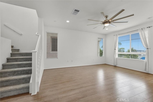 12039 Stanley Park Ct, Hawthorne, CA 90250 - empty room featuring ceiling fan, stairway, wood finished floors, and recessed lighting