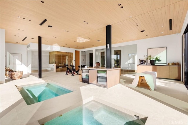 25151 Jim Bridger Rd, Hidden Hills, CA 91302 - indoor pool featuring a hot tub