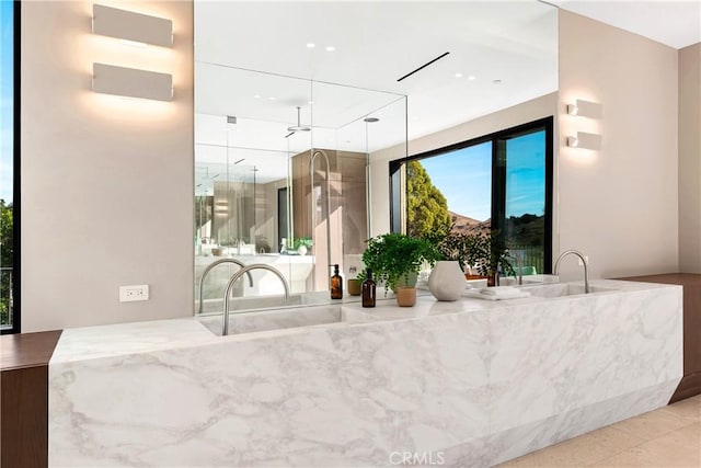 25151 Jim Bridger Rd, Hidden Hills, CA 91302 - interior space with a tub with marble appearance and a marble finish shower
