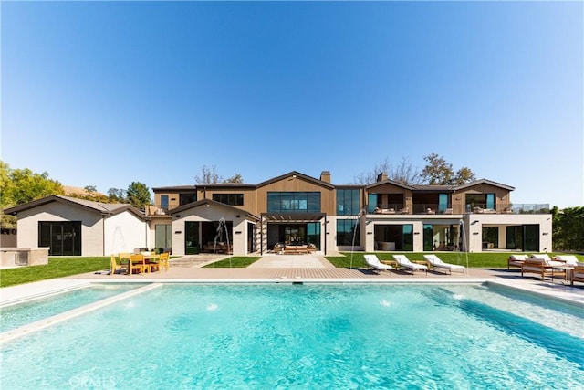 25151 Jim Bridger Rd, Hidden Hills, CA 91302 - swimming pool with a patio and a yard