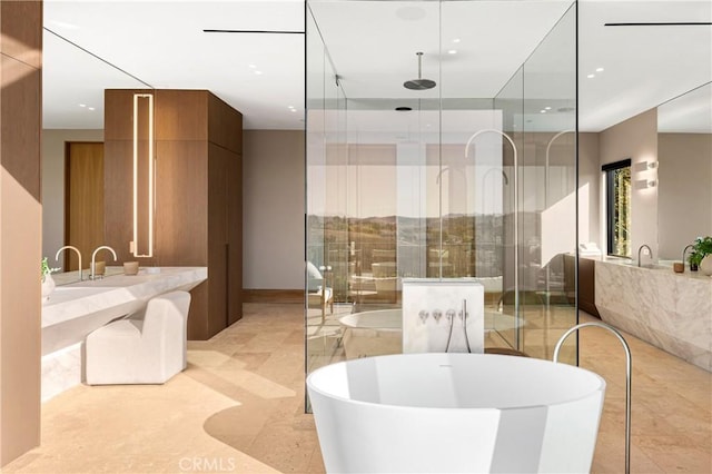 25151 Jim Bridger Rd, Hidden Hills, CA 91302 - bathroom featuring a freestanding bath, a stall shower, vanity, and recessed lighting