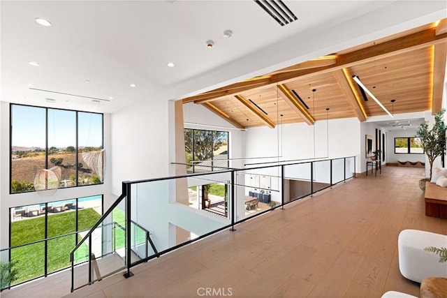 25151 Jim Bridger Rd, Hidden Hills, CA 91302 - hallway with hardwood / wood-style flooring, an upstairs landing, recessed lighting, and wood ceiling